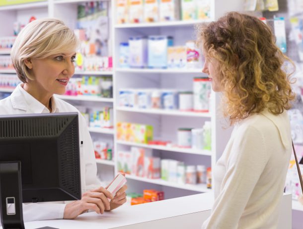 Pharmacist explaining the drug to patient